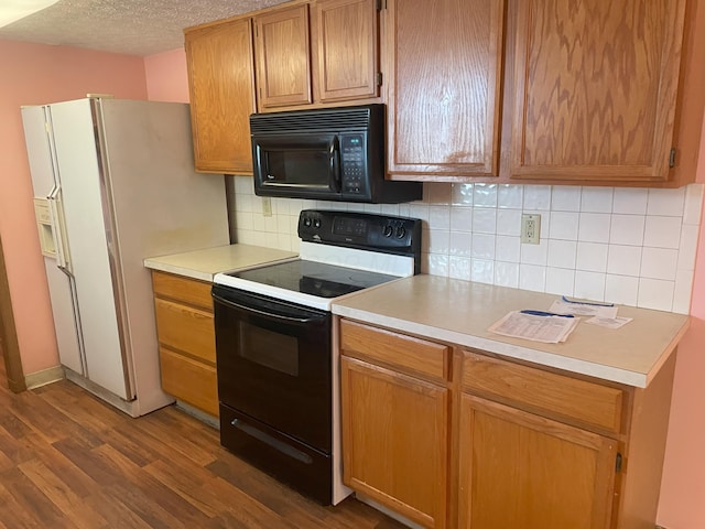 kitchen featuring white fridge with ice dispenser, a textured ceiling, dark wood-type flooring, decorative backsplash, and electric range