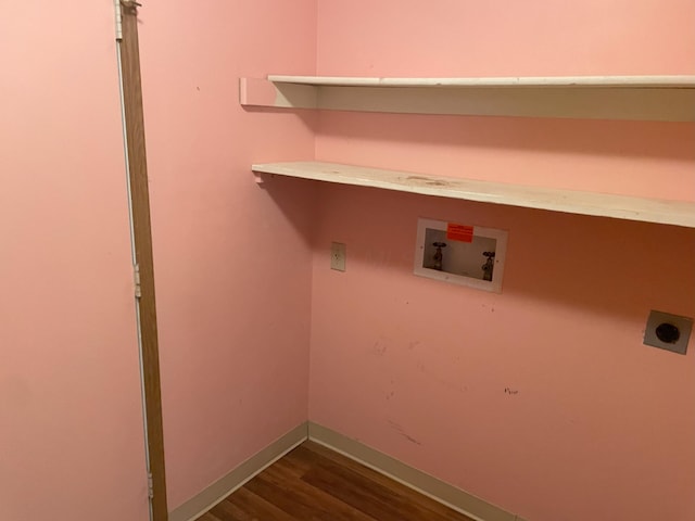 laundry area with light hardwood / wood-style floors, hookup for a washing machine, and electric dryer hookup