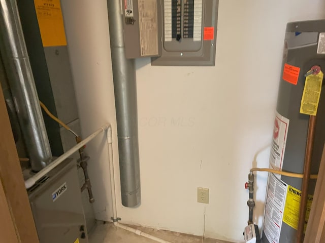 utility room featuring gas water heater