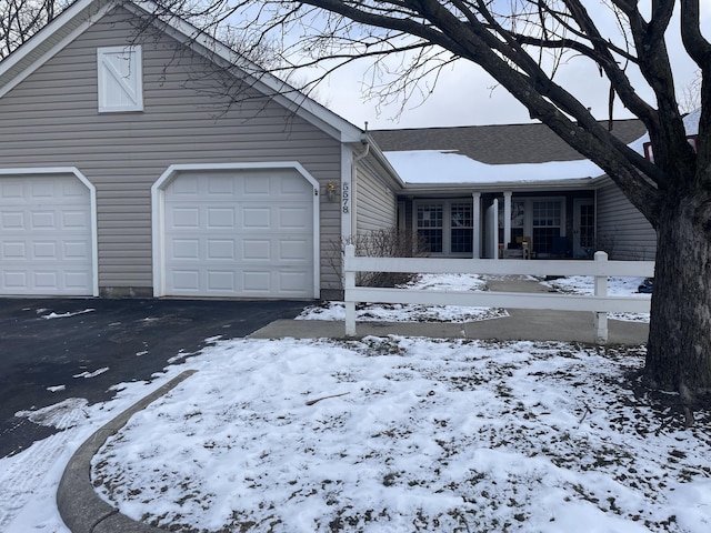 single story home with a garage