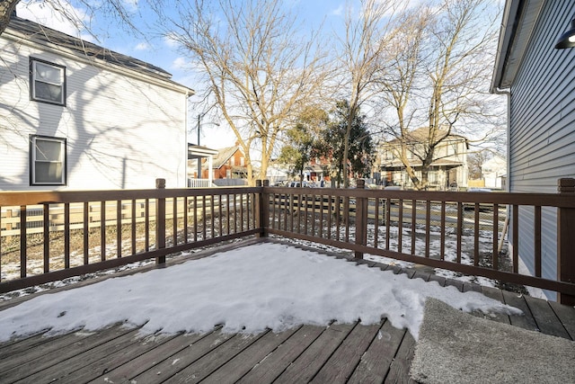 view of snow covered deck