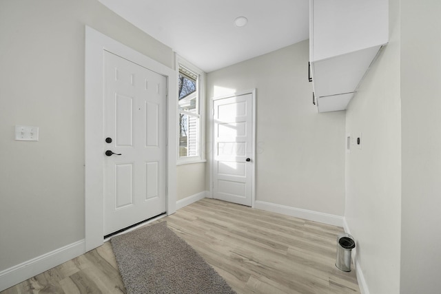 foyer with light hardwood / wood-style floors