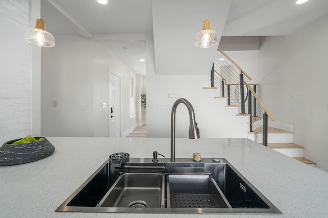 kitchen with sink and decorative light fixtures