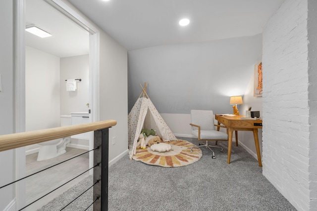 sitting room featuring carpet flooring