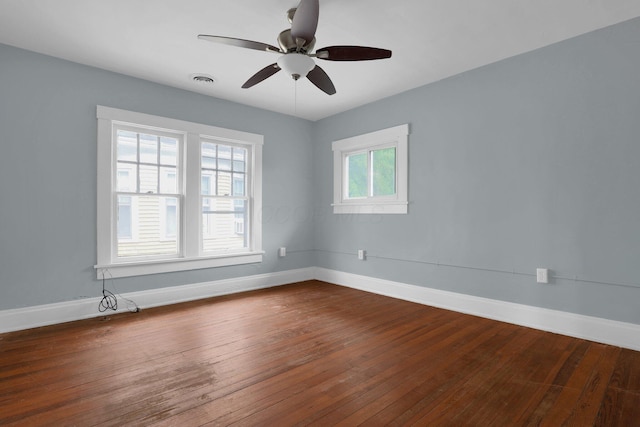 empty room featuring wood-type flooring and ceiling fan