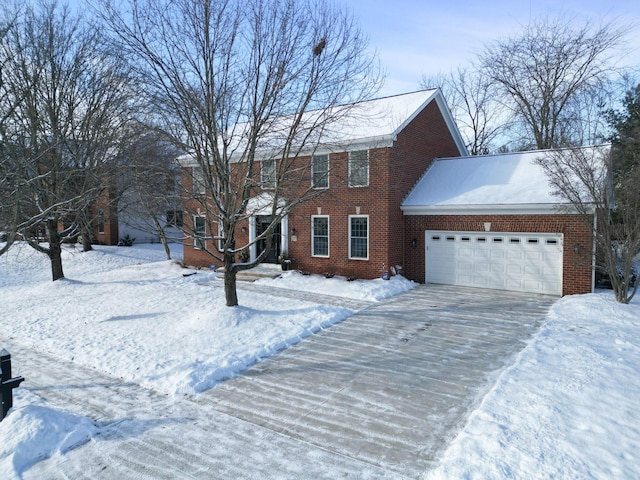 colonial home featuring a garage