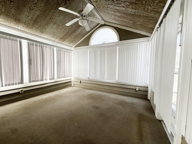 unfurnished sunroom with ceiling fan and vaulted ceiling