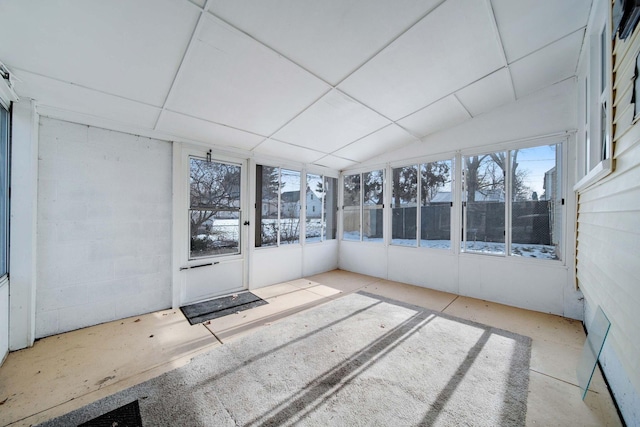 unfurnished sunroom featuring a paneled ceiling