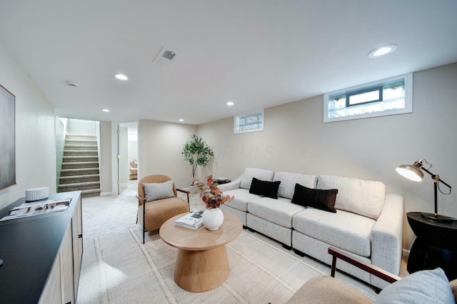 living room with light colored carpet