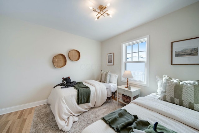 bedroom featuring wood-type flooring