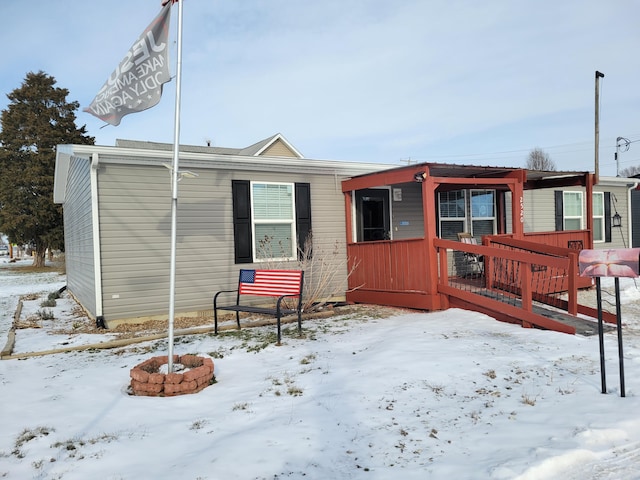 view of snow covered property