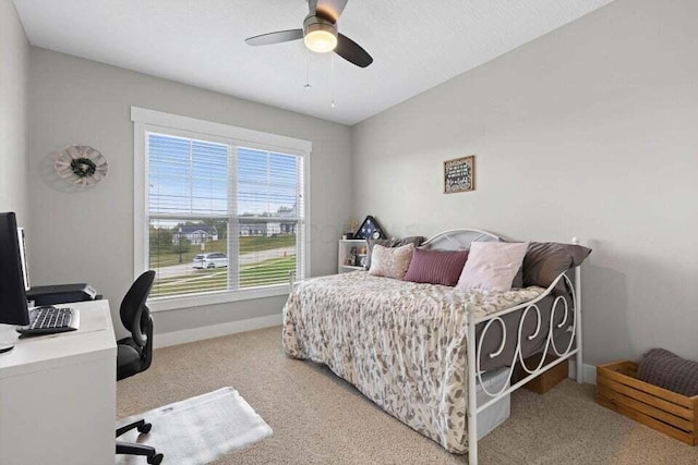 carpeted bedroom with ceiling fan