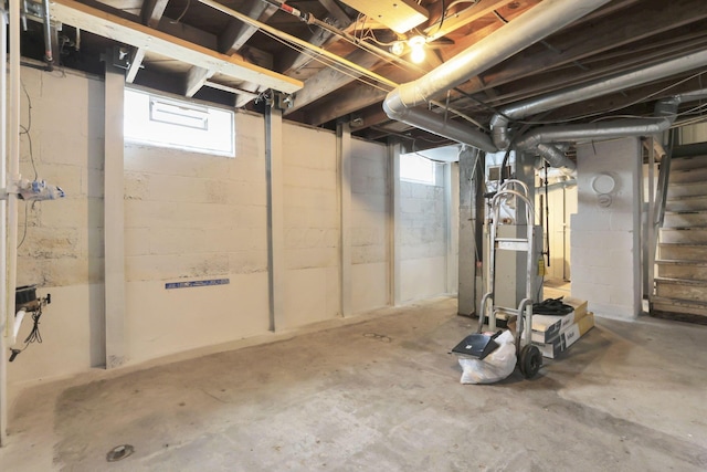1973 Dartmouth Ave, Columbus, OH 43219 - basement with stairs and heating unit