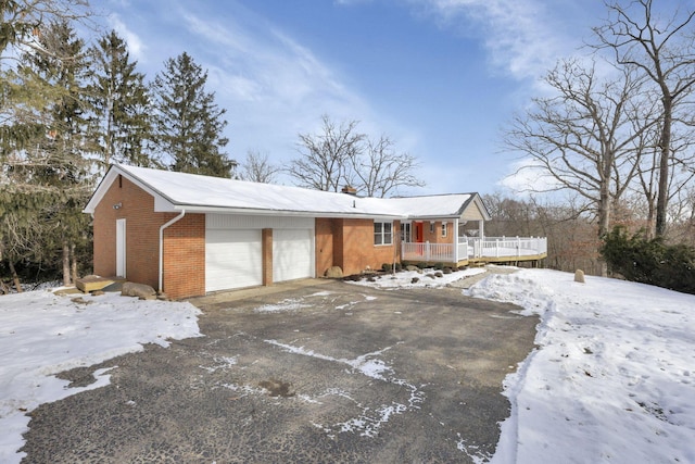 view of front of property with a garage and a porch