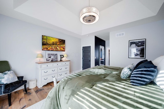 bedroom featuring wood-type flooring