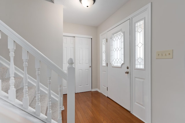 foyer with wood-type flooring