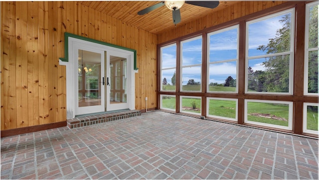 1859 Hardscrabble Rd, Alexandria, OH 43001 - unfurnished sunroom featuring wooden walls, plenty of natural light, brick floors, wood ceiling, and french doors