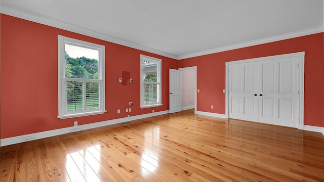 1859 Hardscrabble Rd, Alexandria, OH 43001 - unfurnished bedroom featuring crown molding, baseboards, light wood-type flooring, and a closet