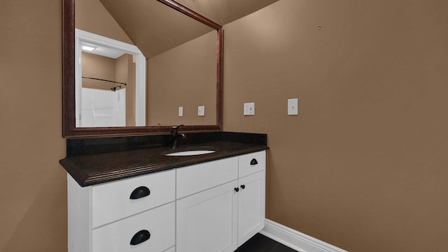 1859 Hardscrabble Rd, Alexandria, OH 43001 - bathroom featuring vanity, baseboards, and vaulted ceiling