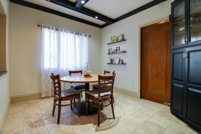 tiled dining area with beam ceiling