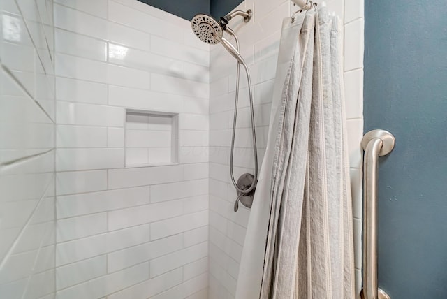 bathroom with curtained shower