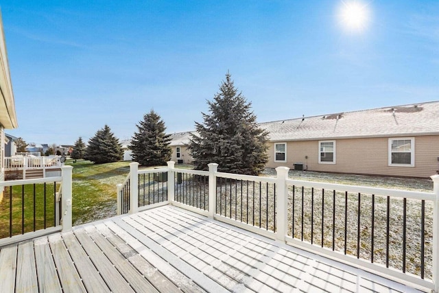 wooden deck with a yard