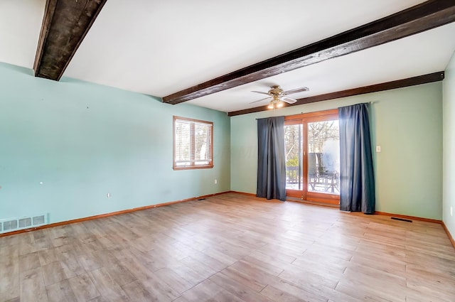 empty room with beamed ceiling, ceiling fan, and light wood-type flooring