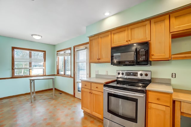 kitchen featuring stainless steel range with electric cooktop