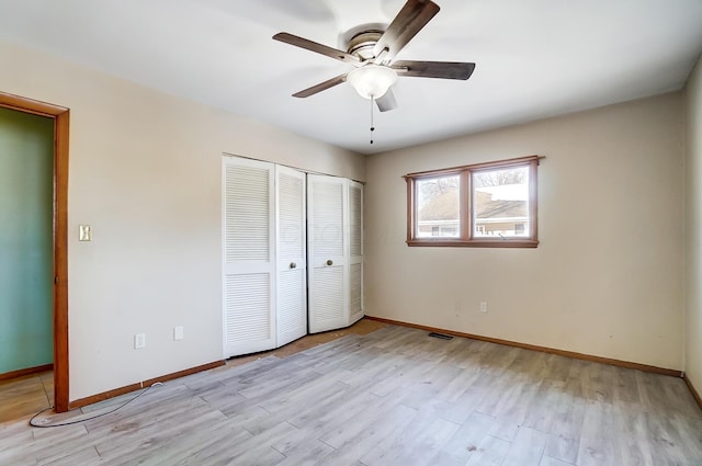 unfurnished bedroom featuring a closet, ceiling fan, and light hardwood / wood-style floors