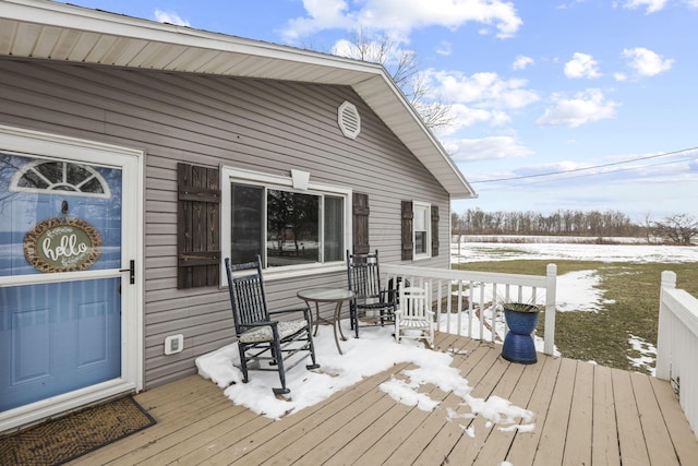 view of snow covered deck