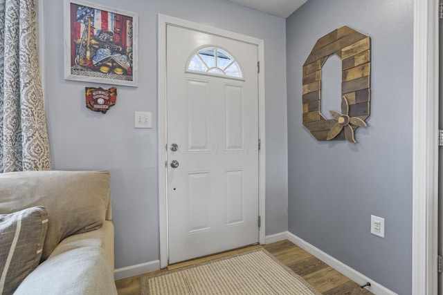 foyer entrance featuring hardwood / wood-style flooring