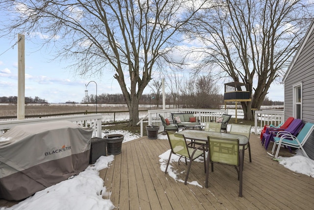 view of snow covered deck