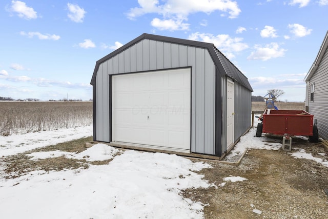 view of snow covered garage