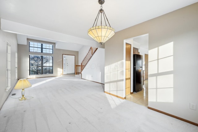 interior space with light colored carpet