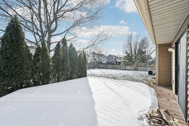 view of yard covered in snow