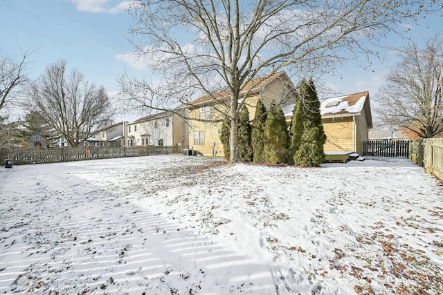 view of yard covered in snow