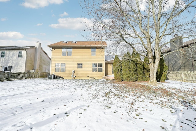 view of snow covered house