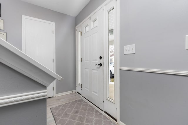 entrance foyer with light hardwood / wood-style flooring