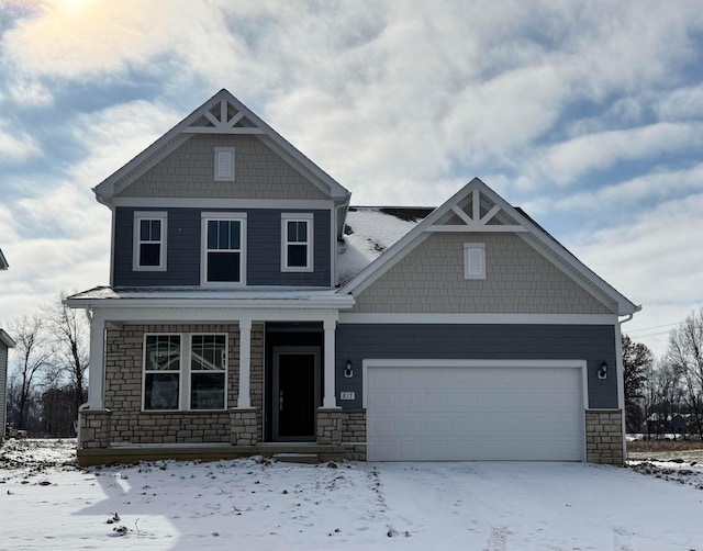 craftsman house featuring a garage