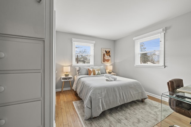 bedroom featuring light wood-type flooring