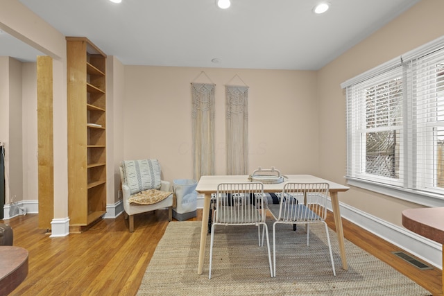 dining room with light hardwood / wood-style flooring