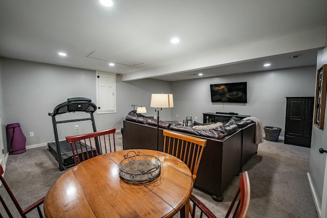 dining area featuring carpet