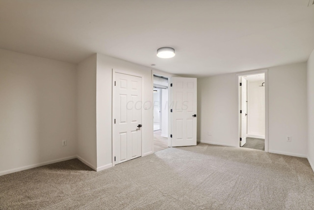 empty room featuring carpet floors