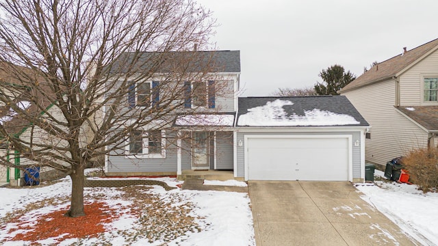 view of front of property with a garage