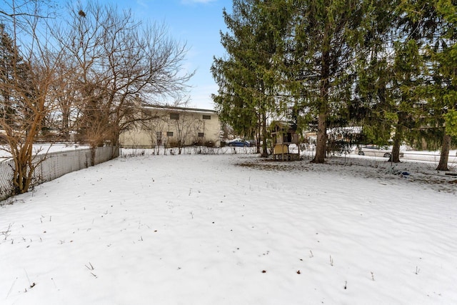 view of yard covered in snow