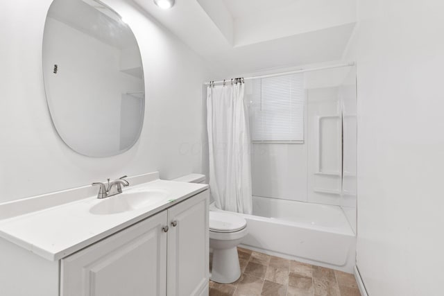 full bathroom featuring shower / bath combination with curtain, vanity, and toilet