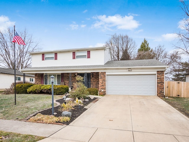 front of property with a garage