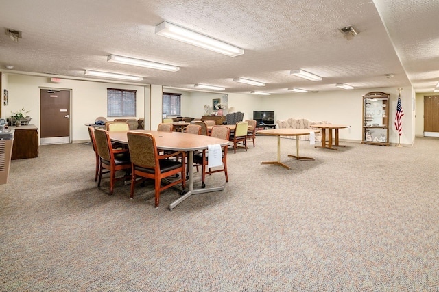 dining room featuring a textured ceiling