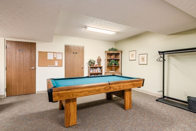 rec room featuring carpet floors, billiards, and a textured ceiling