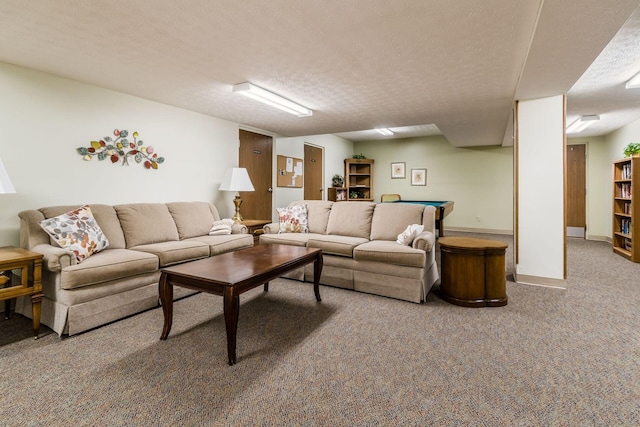 carpeted living room featuring a textured ceiling and billiards